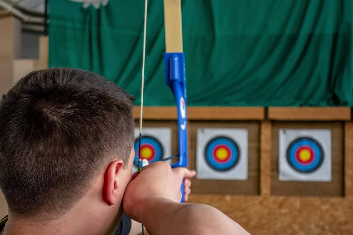 archery, bow, shoot, target, objective, arrow, archer, sport, room, person, archery, archery, archery, archery, archery, archer, archer